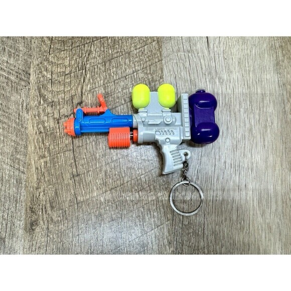 Basic Fun Other - Vtg Super Soaker Pump Action Water Gun Pistol Keychain Keyring Larami 1995 90s